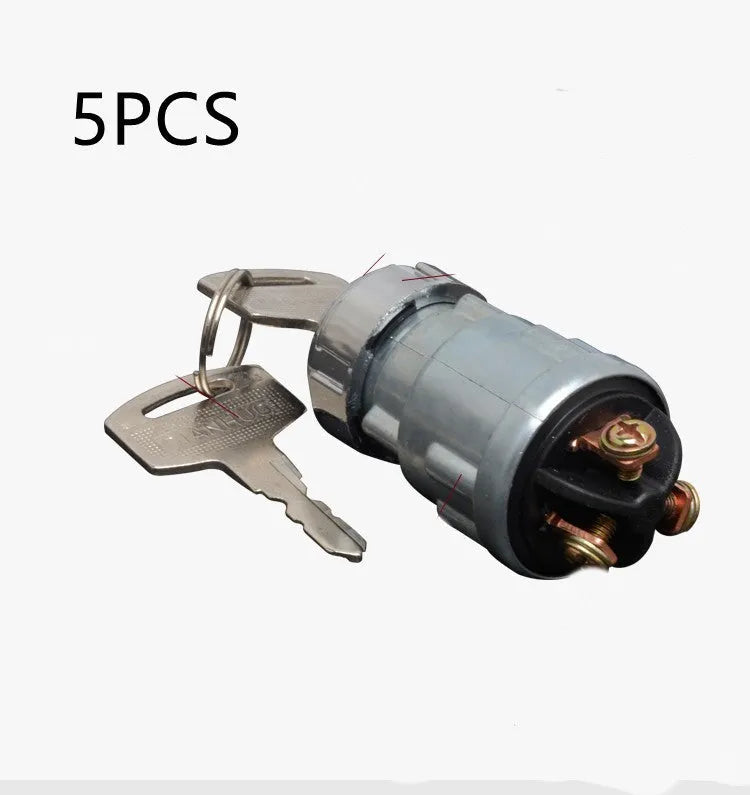 Copper ignition switch with key for trucks and forklifts, showing colour-coded key options