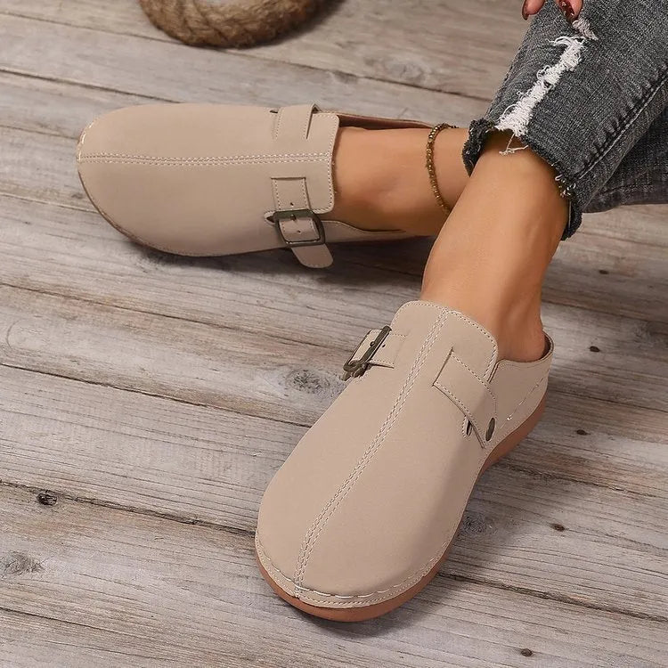 Women's casual wedge slipper in a choice of colours, showing closed toe and rubber sole.