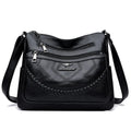 Soft PU leather crossbody shoulder bag in a horizontal square shape, shown in one of four colours: black, blue, red, or yellow.