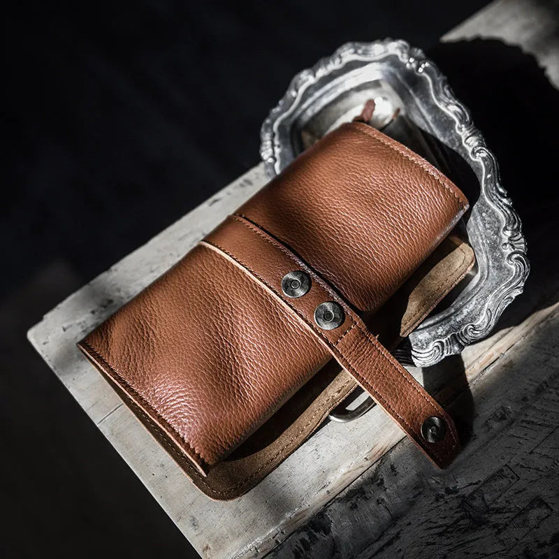 Handmade cow leather vintage bi-fold wallet with tape extraction closure