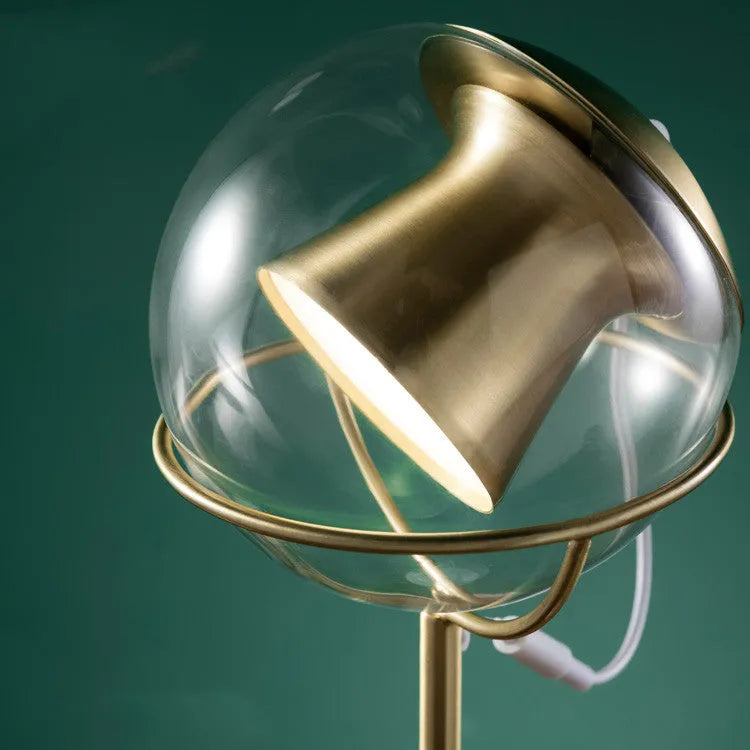 Modern glass desk lamp with a dimmable LED light source and touch switch.