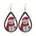 Wooden Christmas earrings with printed geometric designs featuring Santa Claus elements
