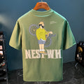 Green loose fit men's short sleeve t-shirt with a printed design on the front.