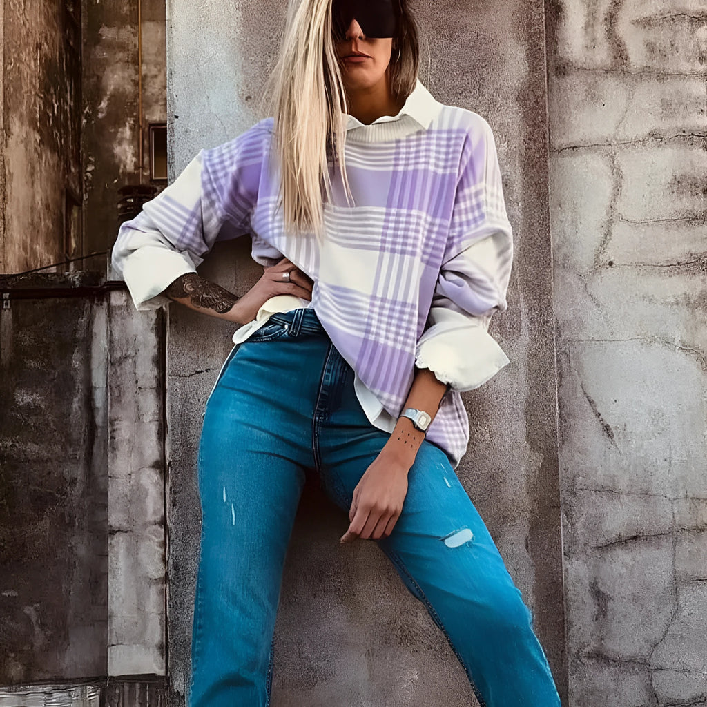 Lilac plaid print loose sweater with ribbed trim and long sleeves on hanger