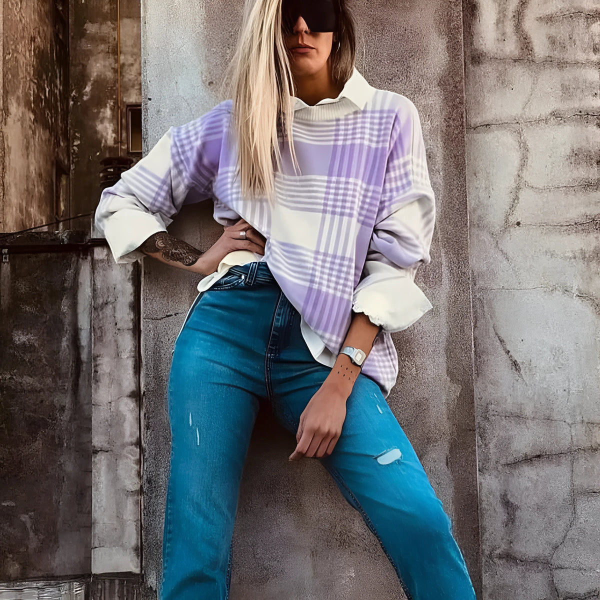 Lilac plaid print loose sweater with ribbed trim and long sleeves on hanger