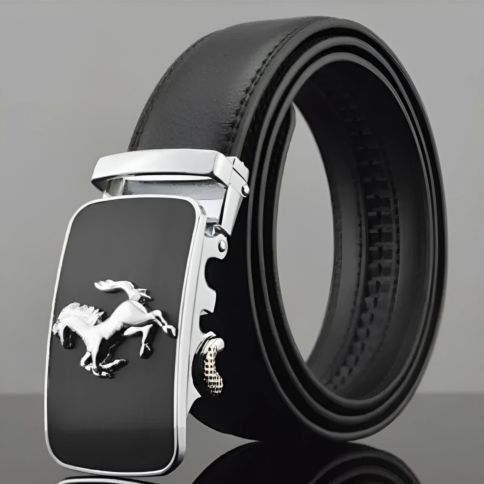 Men's black leather belt with automatic buckle showing cowhide texture and decorative pattern options