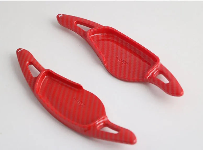 Carbon fibre look steering wheel paddle shift replacements for car interior modification