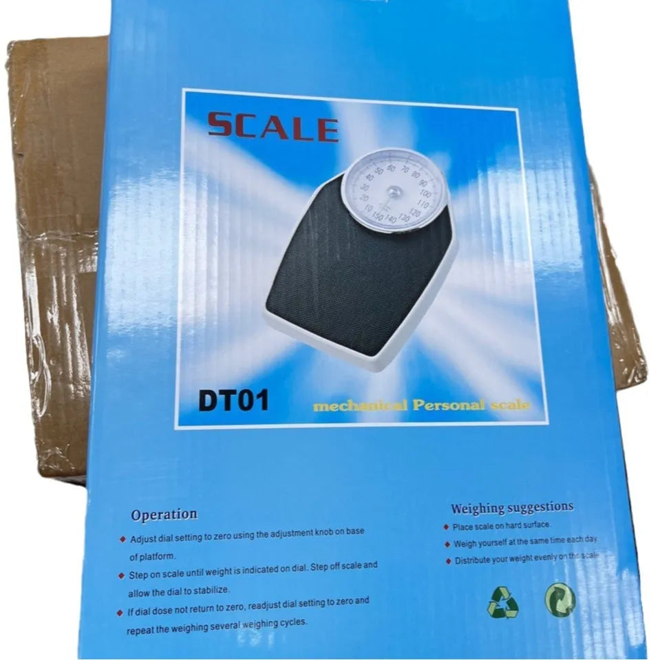 Black mechanical bathroom scale with large analogue dial on 47x35cm platform.