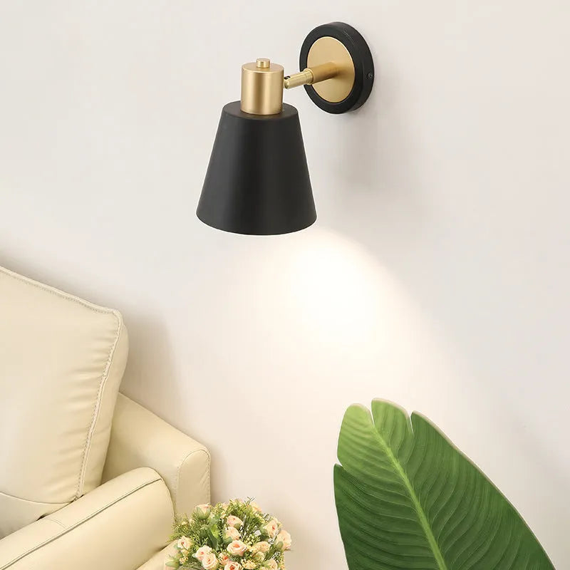 Nordic style iron wall lamp with iron shade showing contemporary design for bedside or living room lighting