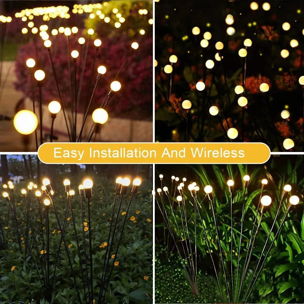 Solar-powered LED firefly ground spike light with multiple heads inserted along a garden path.
