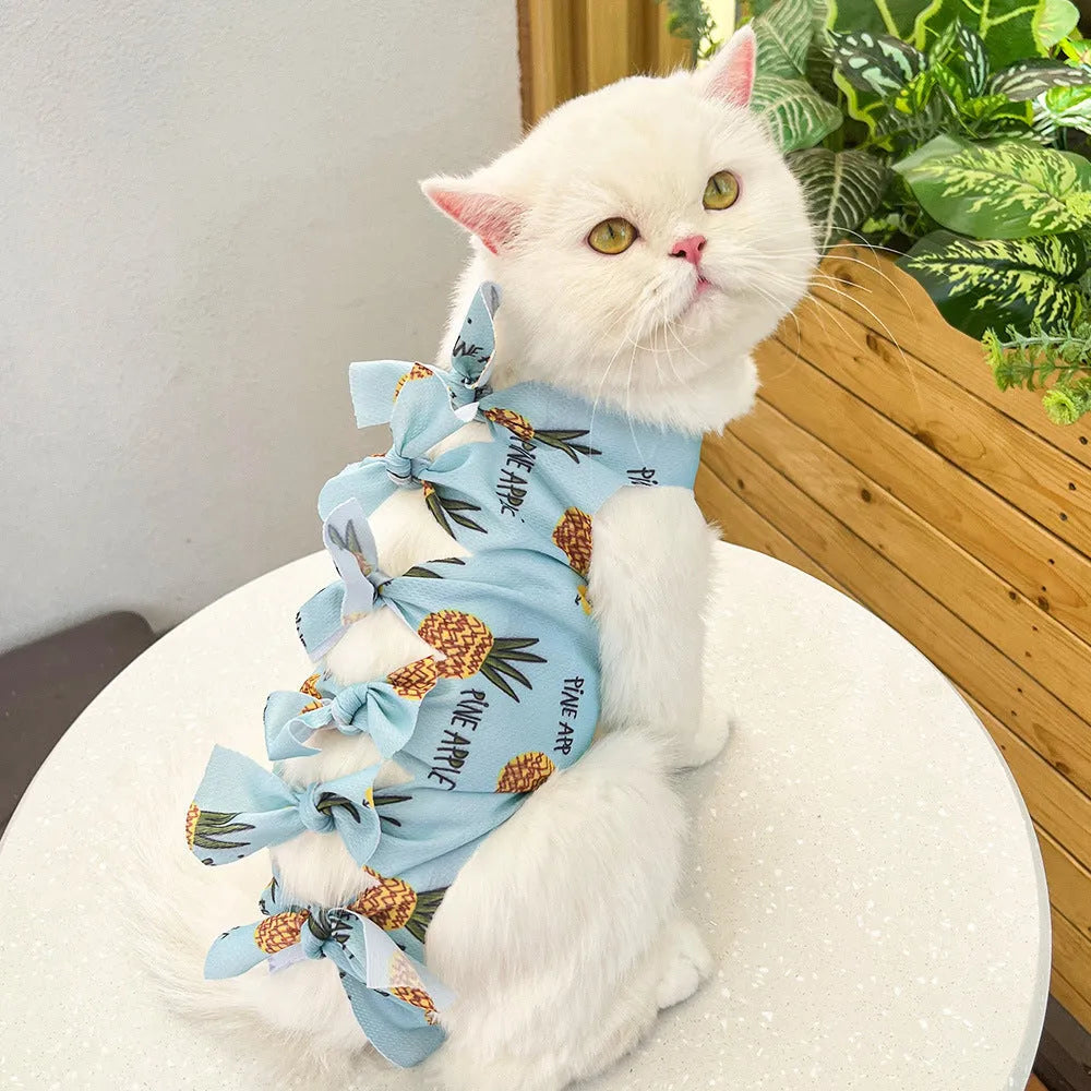 Lace-up polyester cat recovery suit for post-surgery care in blue, shown on a cat mannequin.