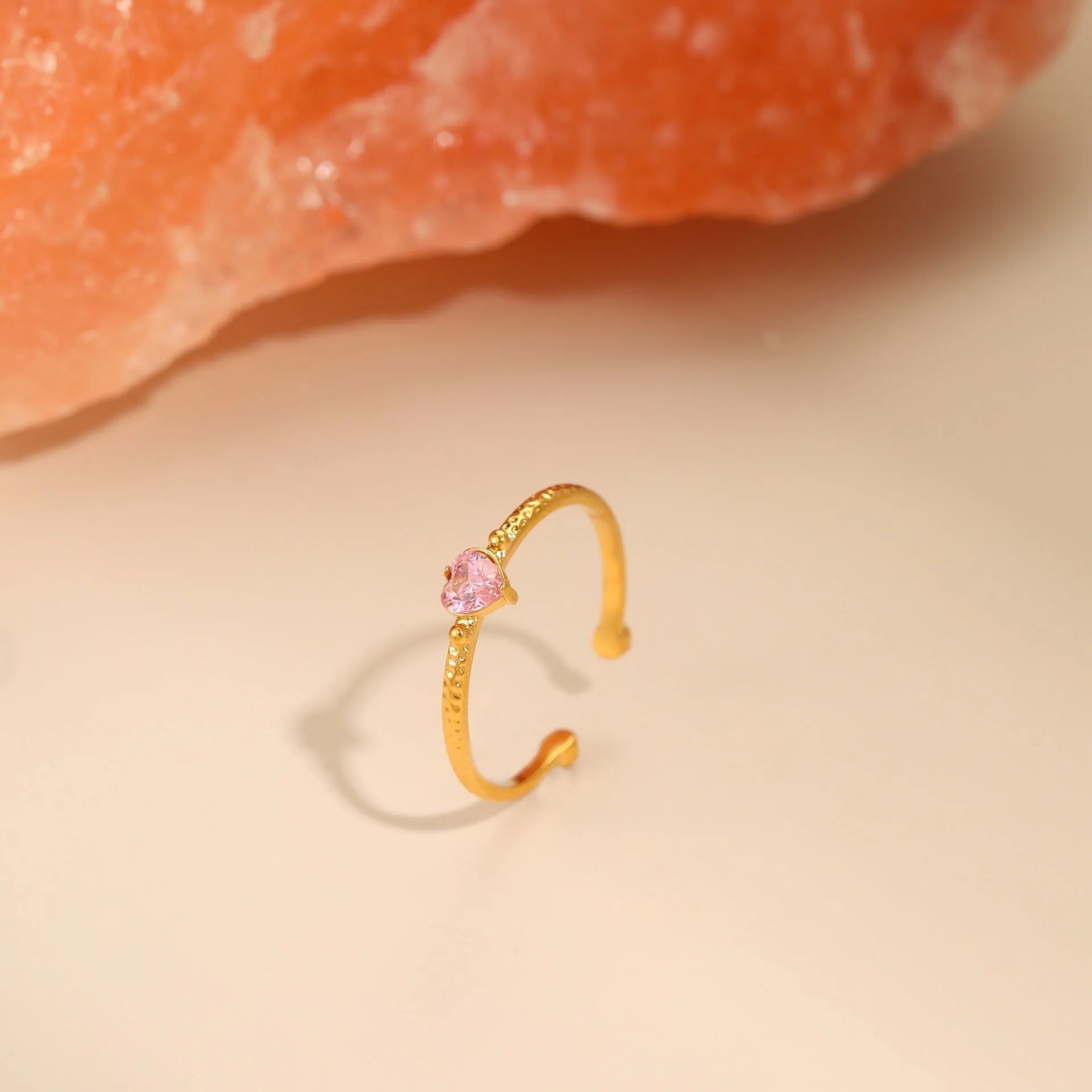 Open-ended heart-shaped ring with geometric design and zircon inlay in stainless steel