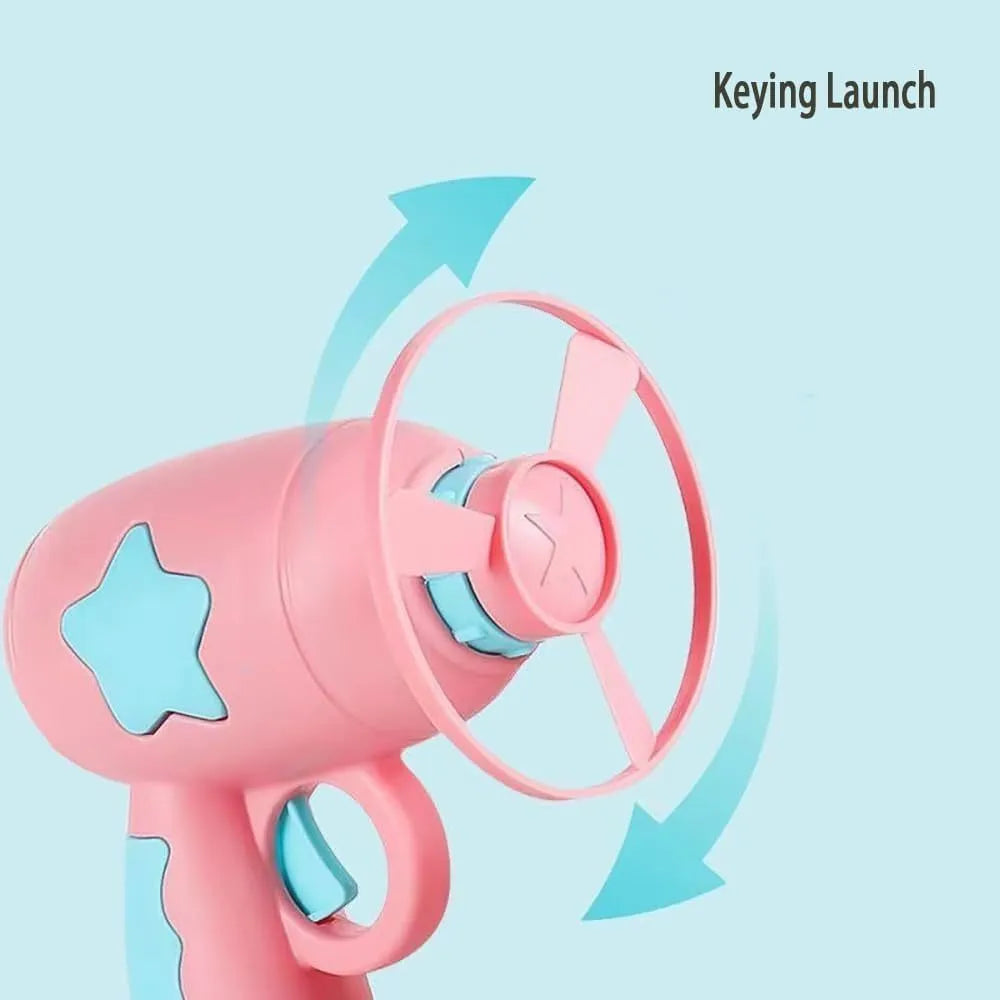 Blue plastic cat toy gun with spinning mechanism and flying disc for indoor feline play