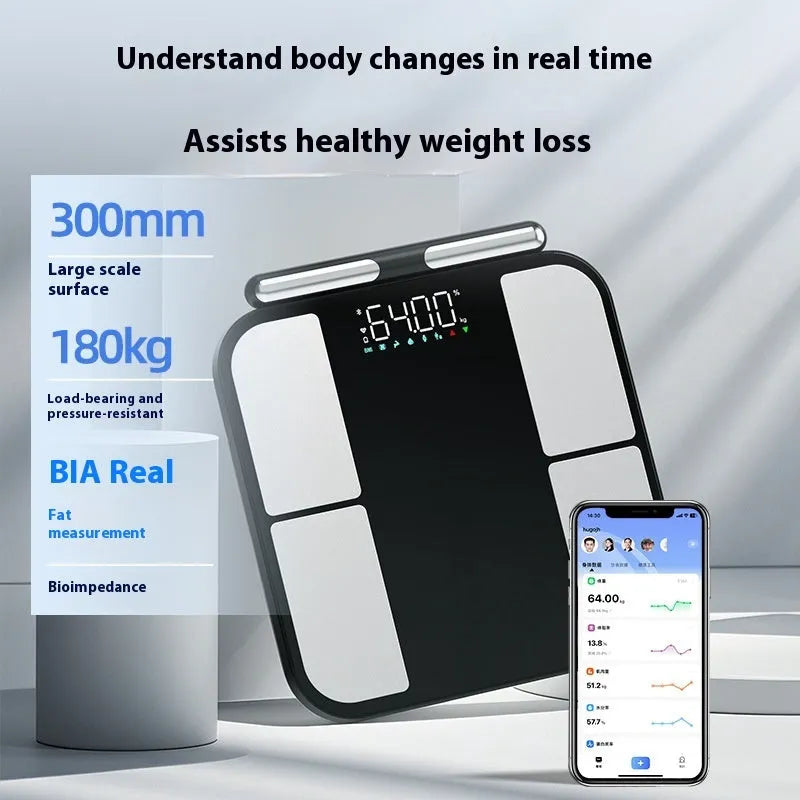 Black electronic body fat scale with tempered glass platform showing colour screen display