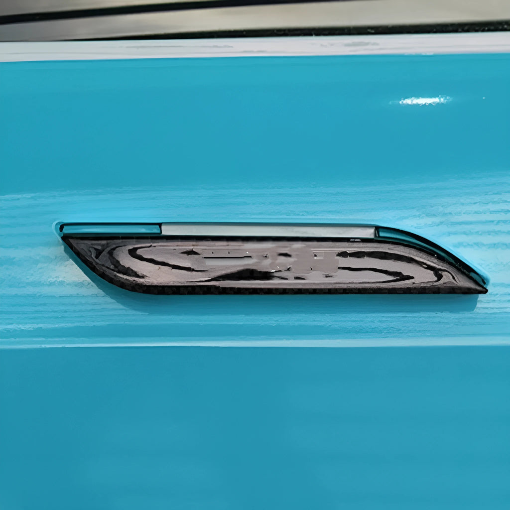 Four carbon fibre adhesive door handle protection patches for Tesla Model S with drip texture finish