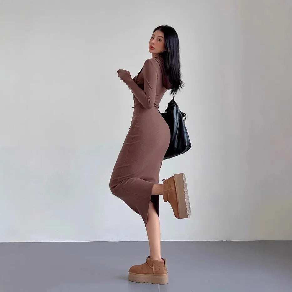 Women's grey hooded long sleeve sheath dress with high waist and over-the-knee length.