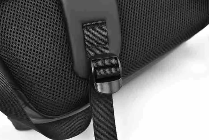 Large waterproof PU leather backpack for men with visible stitching details in black colour