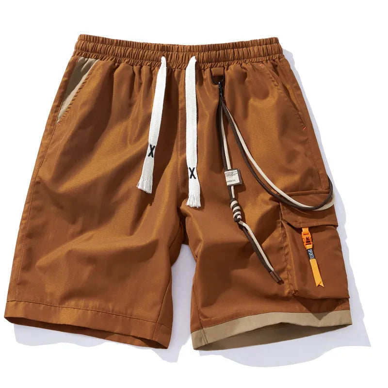 Men's bamboo fibre plus size shorts in loose straight-leg cropped style on a hanger.