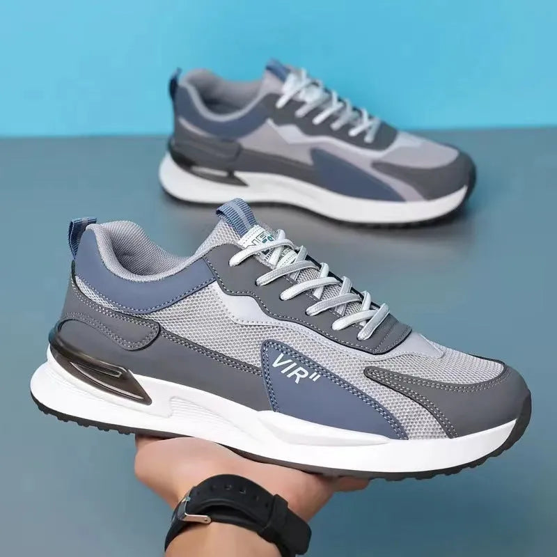 Men's colour block mesh lace-up running shoes in black, grey and white on a white background.