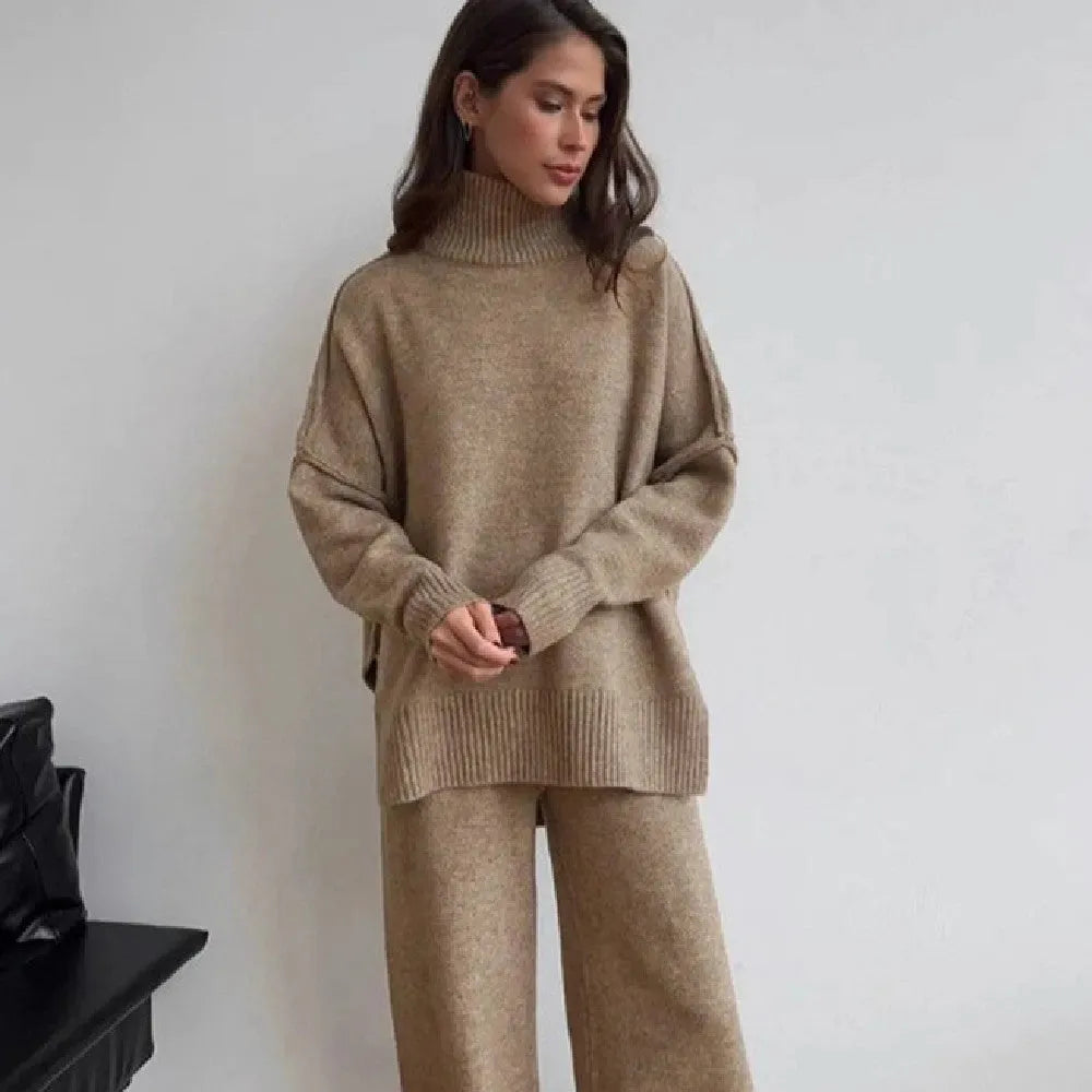 Women's dark grey side-slit sweater with matching trousers two-piece suit on hanger