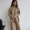 Women's dark grey side-slit sweater with matching trousers two-piece suit on hanger