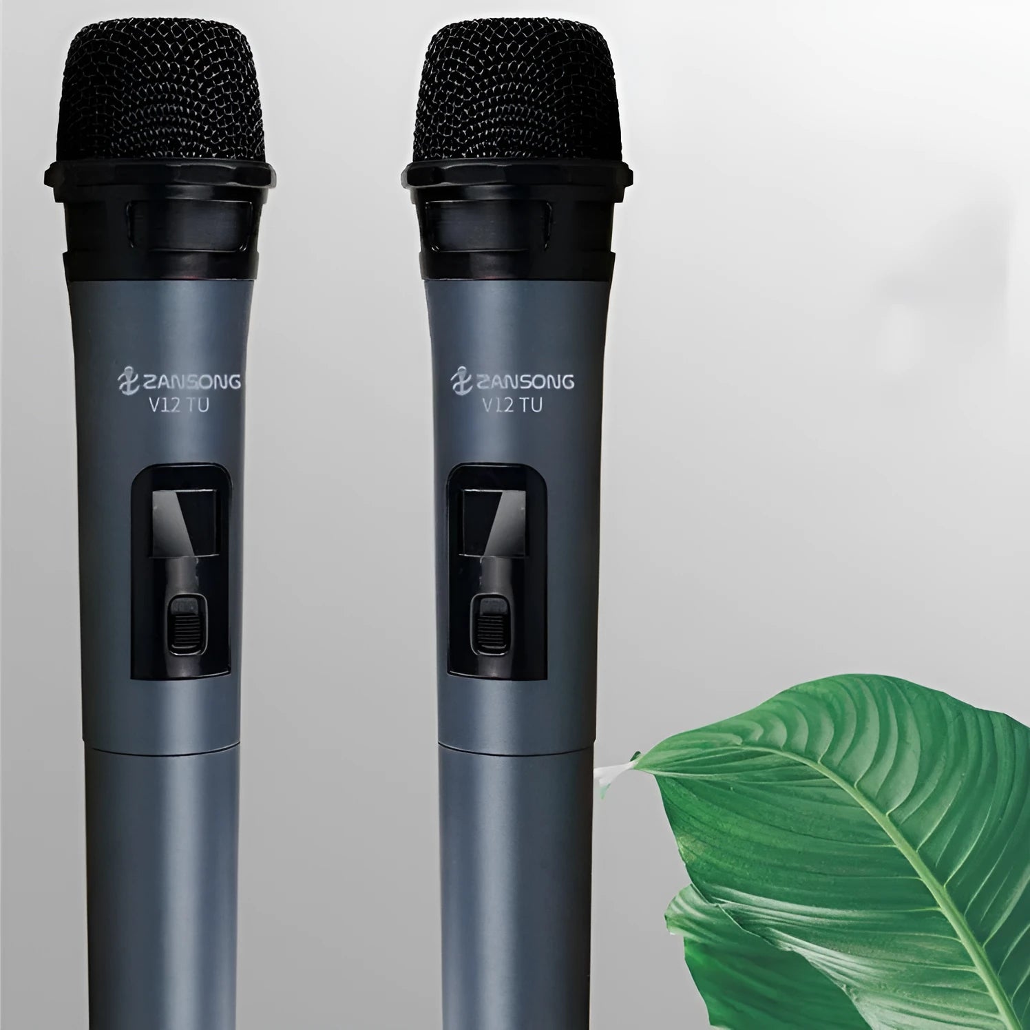 Black V12 dynamic wired microphone with USB receiver, adapter, and audio cable