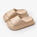 Women's beige fish mouth design EVA foam slippers with a thick 5.5cm sole.