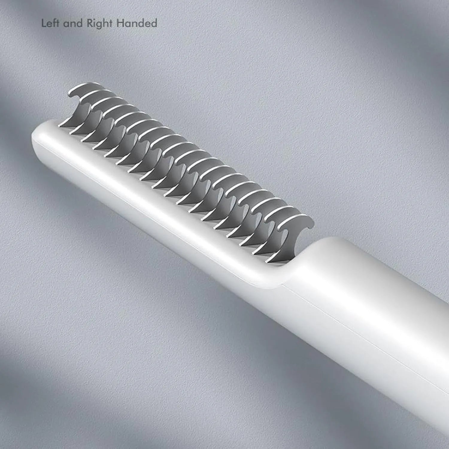 Stainless steel dematting comb for dogs with ergonomic handle in pink or white colour