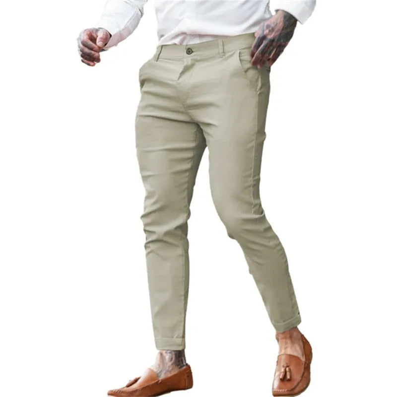 Men's slim fit pencil pants in cotton stretch fabric showing mid waist design and zipper fly closure