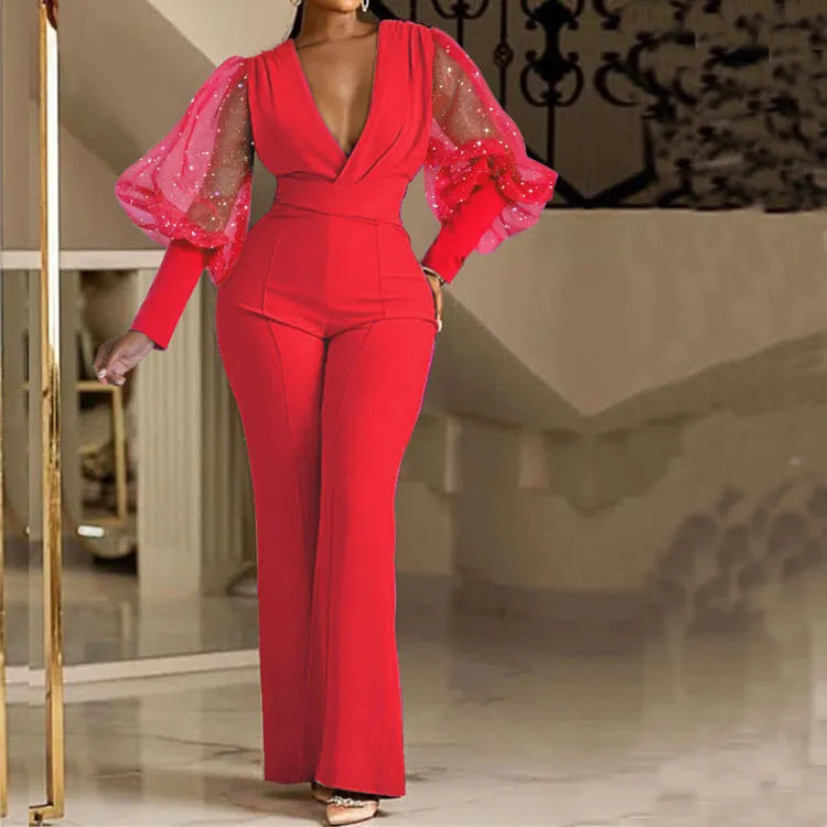 Women's mesh stitch wide leg jumpsuit in polyester with elastic waist shown in blue colour