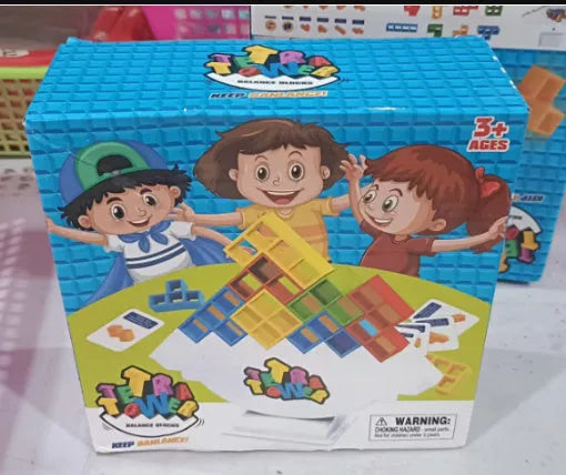 Plastic balance stacking board game with 16 colourful blocks on chassis and base