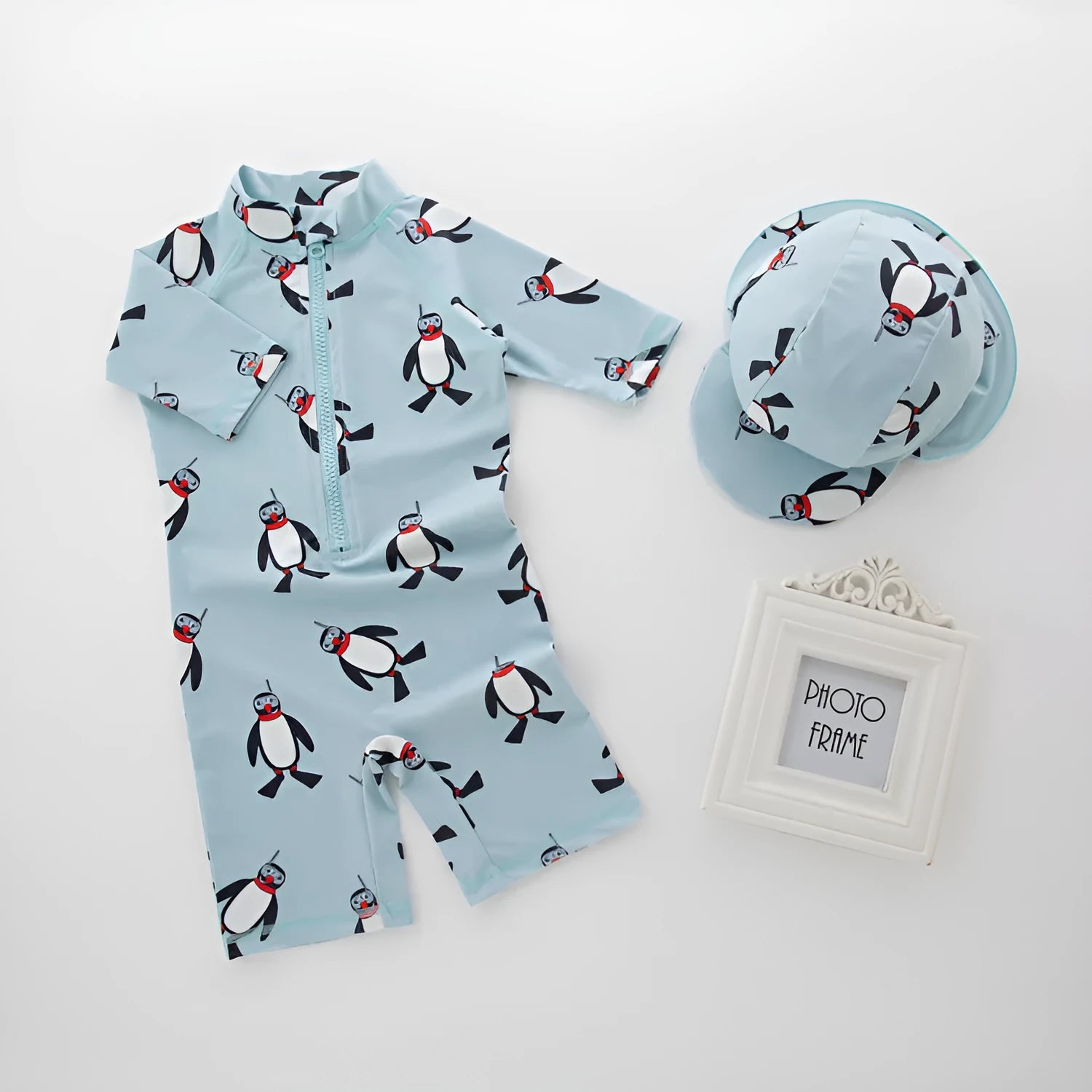 Boys' long sleeve penguin swimsuit with matching swimming cap for beach and pool use