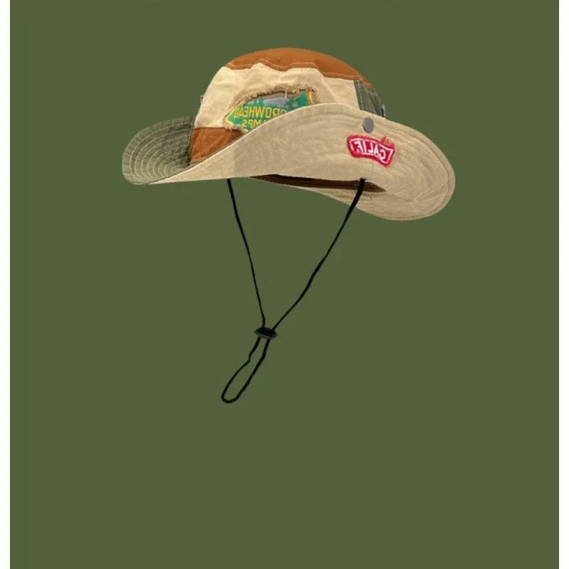 Women's army green cotton fisherman hat with hand-painted patchwork design and flat top crown