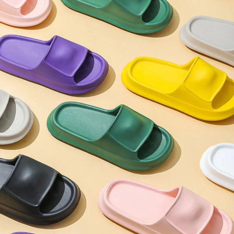 Pair of thick-soled EVA foam flip-flop slippers in a choice of seven colours.