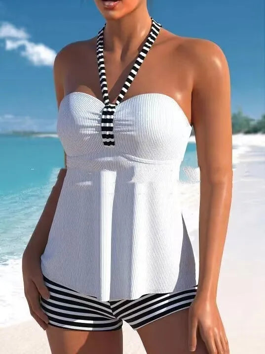 Black and white striped off-shoulder one-piece swimsuit with briefs style bottom.