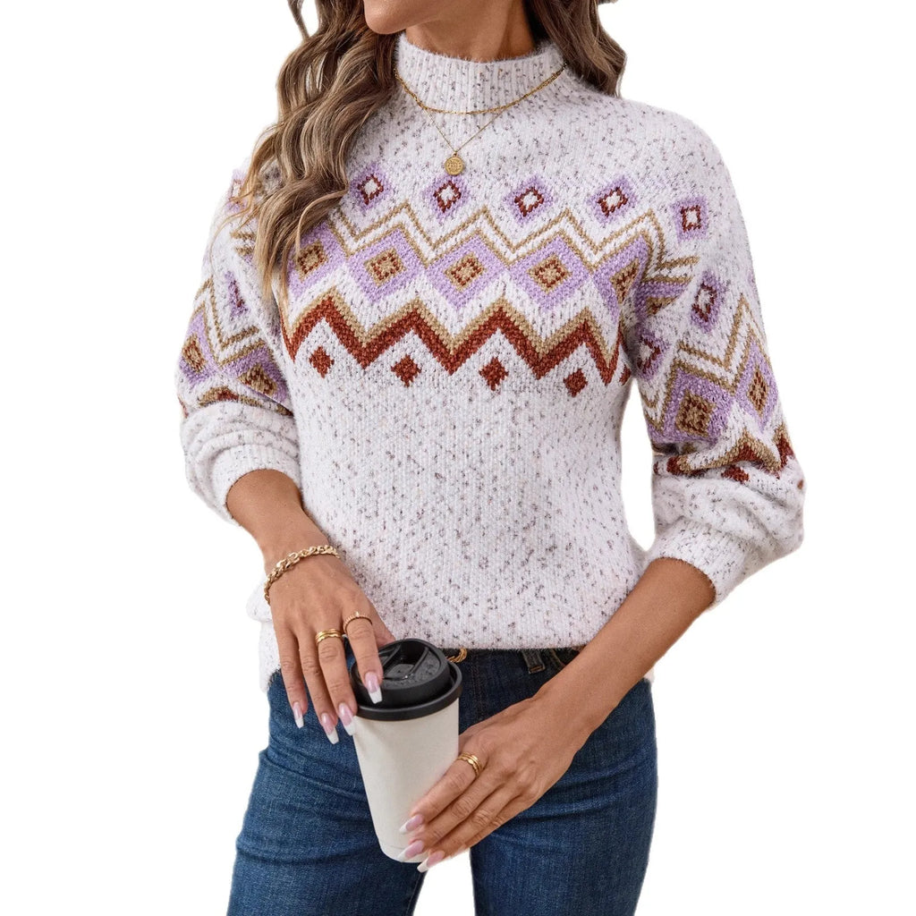 White women's loose geometric jacquard pullover sweater with long sleeves and a half-turtleneck.