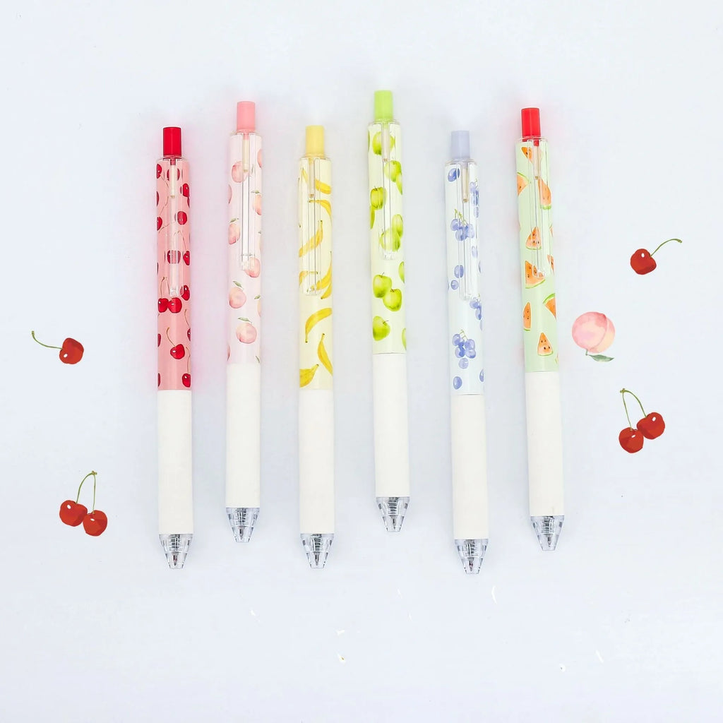 Three fruit scented press-action pens with 0.5mm tips and black ink refills