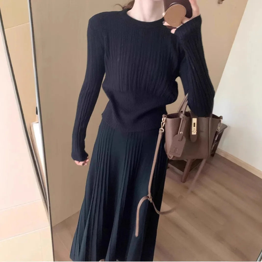 Dark grey knitted long dress suit set with sweater, skirt, and 3D ethnic pattern.