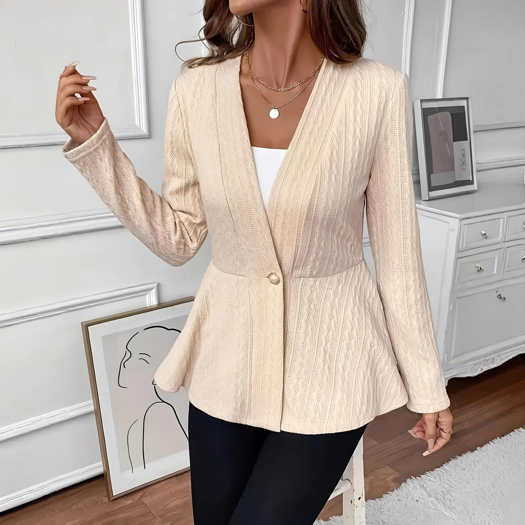 Women's apricot coloured knitted cardigan with single button front and jacquard pattern detail