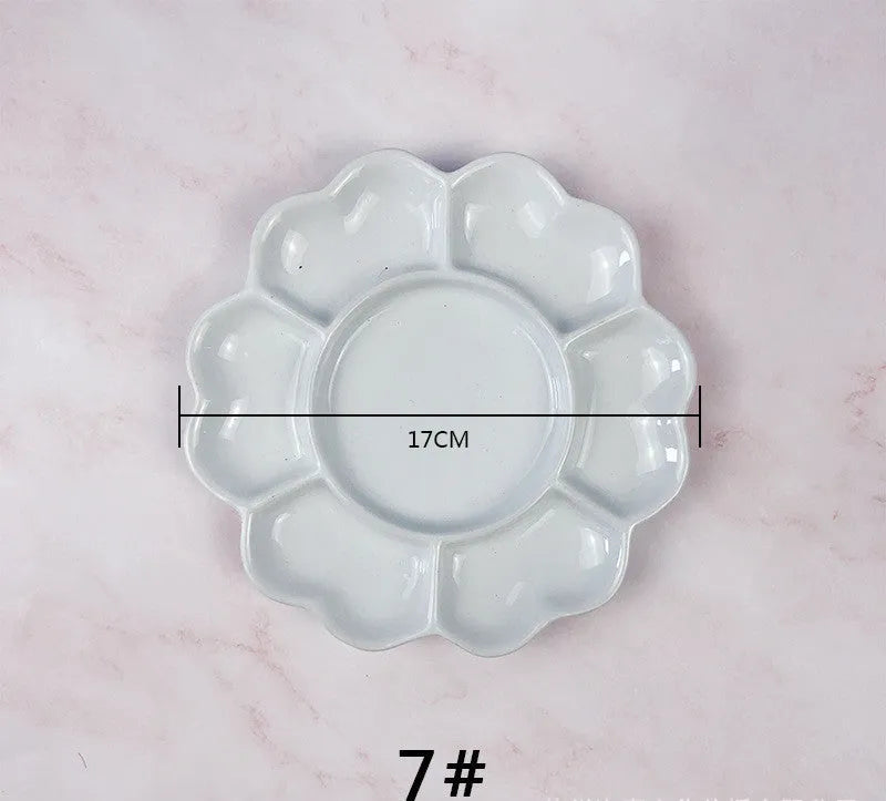 White ceramic painting palette in plum blossom shape for watercolour acrylic oil painting