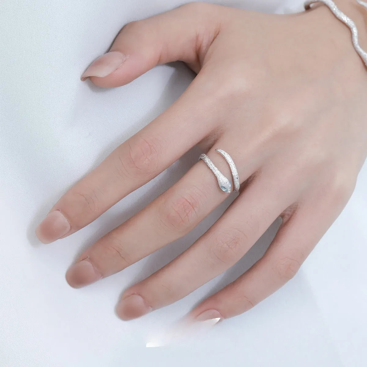 Adjustable silver ring with snake design and white gold electroplated finish for women