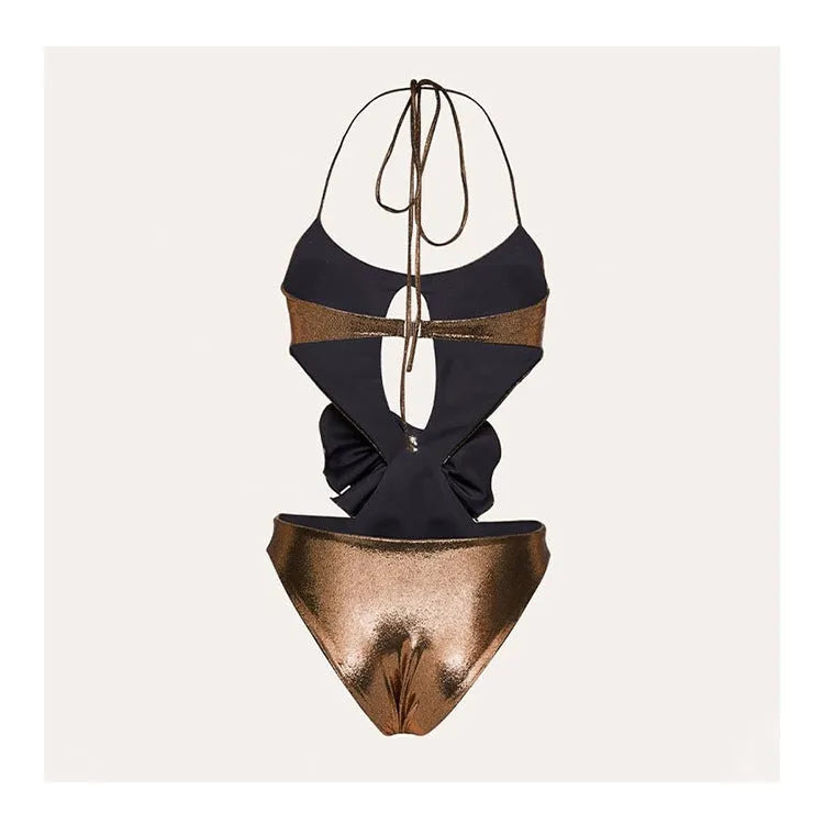 Gold handmade one-piece swimsuit with halter neck and hollow-out design on a mannequin.