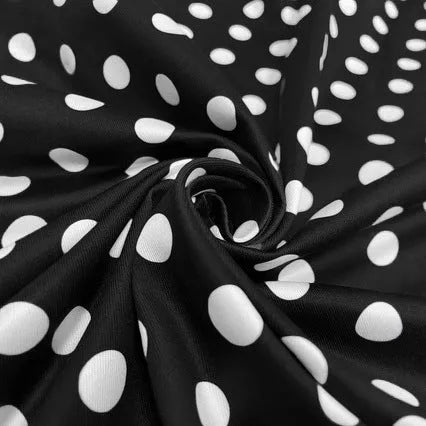 Multicolour polka dot pleated dress with square collar and short sleeves.