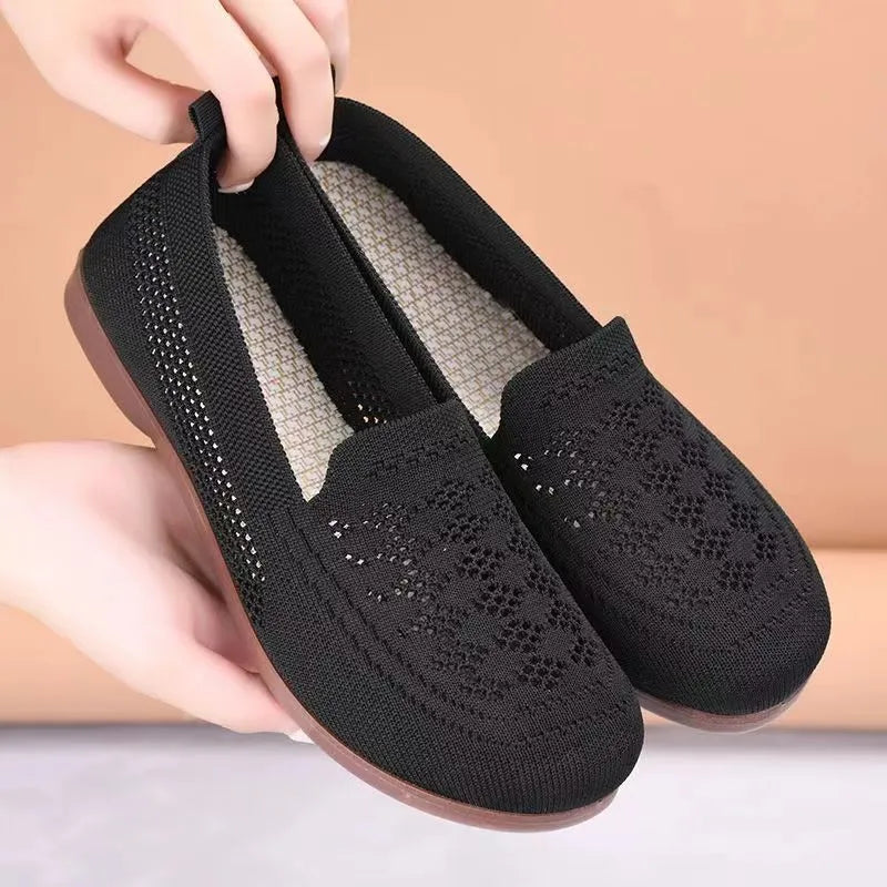 Women's beige low-top tennis shoes with mesh upper and anti-skid sole for wide feet.