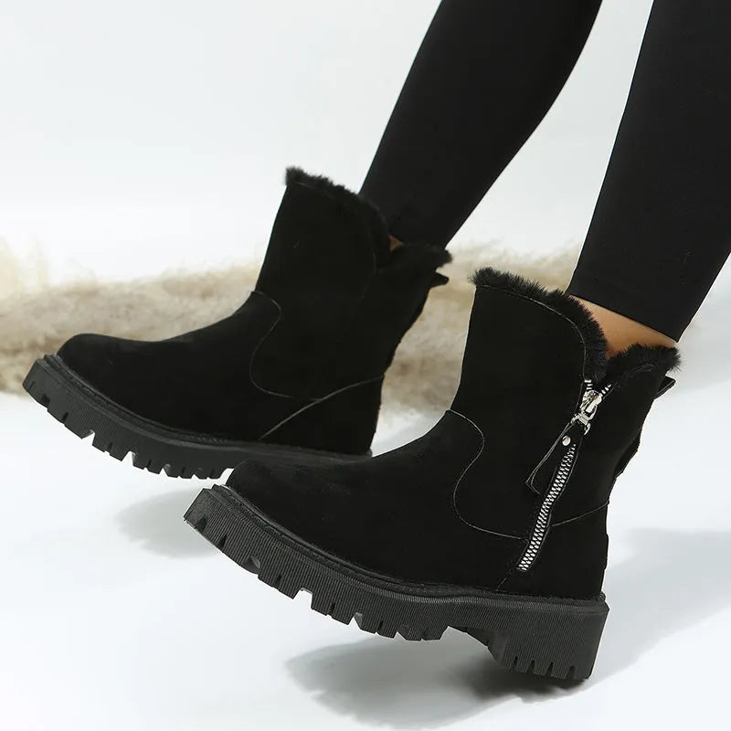 Women's black thick plush high-top snow boots with a side zipper and non-slip sole.