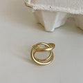 Women's matte metal open ring with three-dimensional interlaced geometric design in gold or silver finish