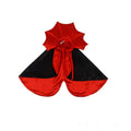 Black and red Halloween costume for a cat or dog on a hanger.