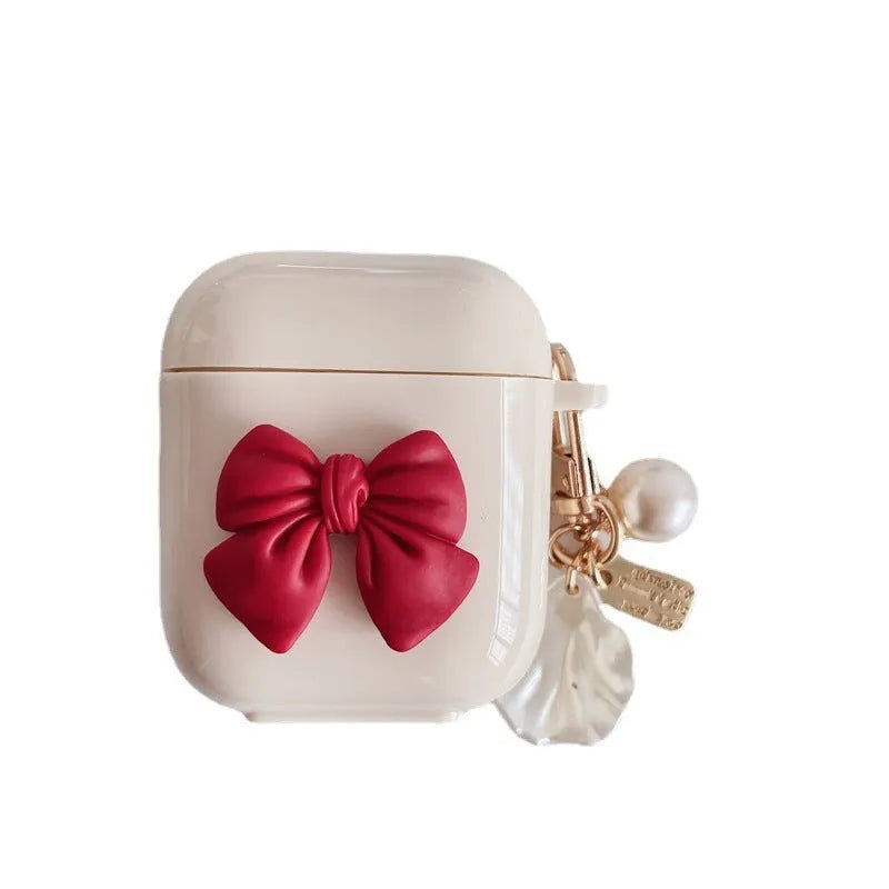 Beige red bow shell TPU protective case with clamshell closure for AirPods Pro wireless earphones