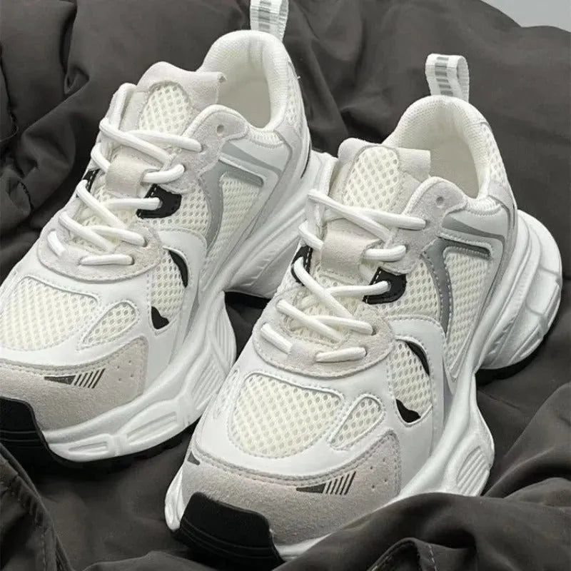 Beige Polar Wave mesh platform sports shoes with a wedge heel and lace-up front.