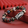 Chinese style lucky bracelet with colourful coloured glaze beads and auspicious patterns.